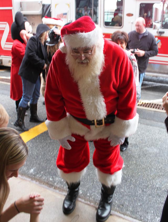 Children's Christmas Party at 8-100. 12-9-2012. Santa pays a visit . Photo by Vincent P. Tuzzolino